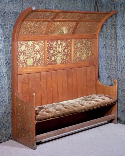Settle with gilded gesso decoration, made by Morris and Company by Philip Webb